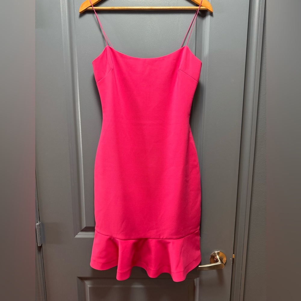 Likely banks dress in fuchsia